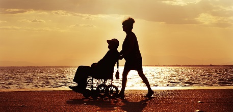 wheelchair being pushed_457x220