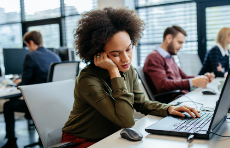 Woman asleep at desk