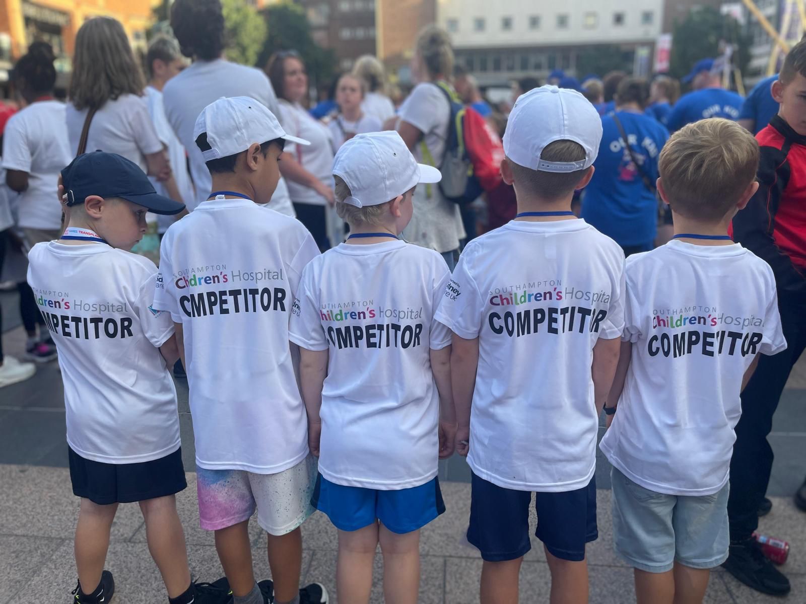 Five children in competitor t-shirts for the Transplant Games