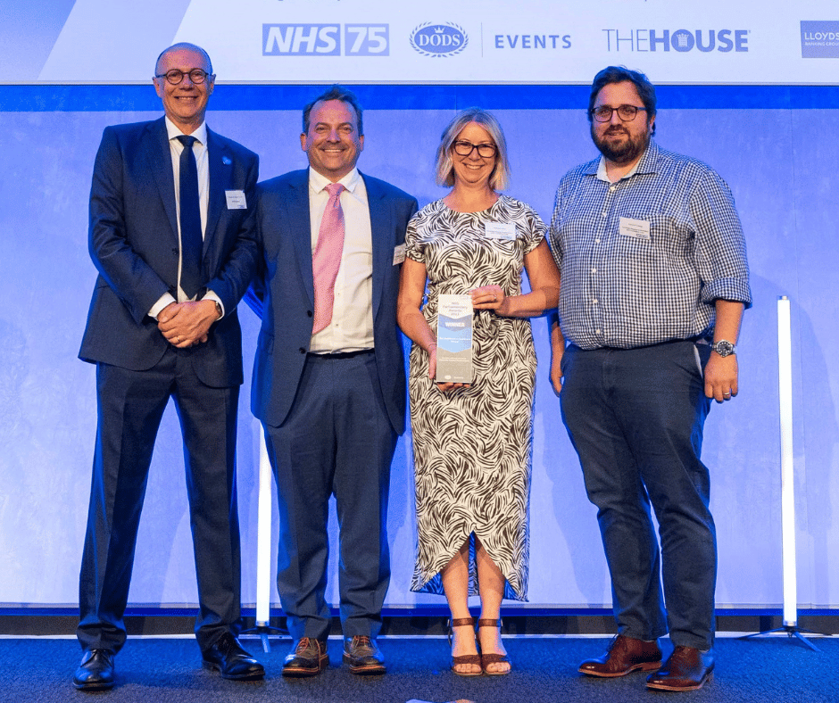 Prostate self referral team receiving their award
