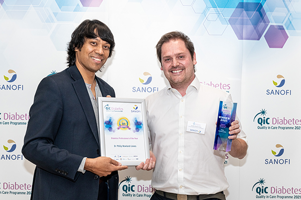 Philip Newland Jones receives his QiC award