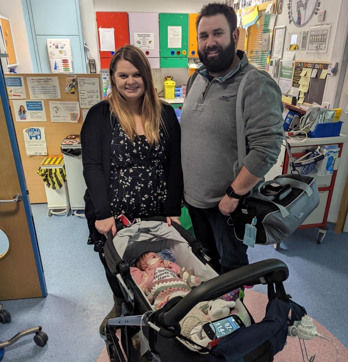 Lizzie and Nathan Fulton leave Southampton Children's Hospital with baby daughter Pippa