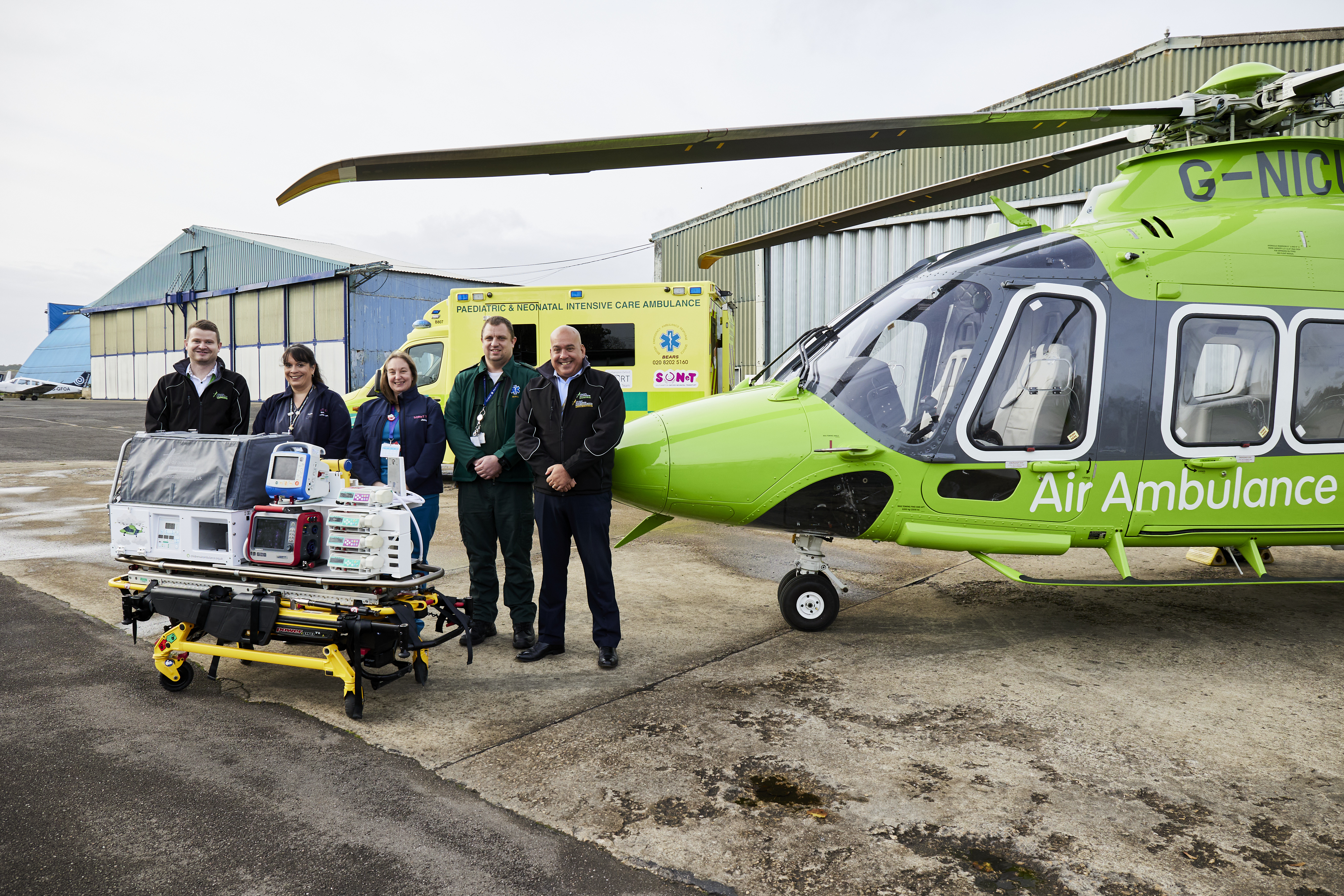 Members of SONeT and Children's Air Ambulance with the new incubator