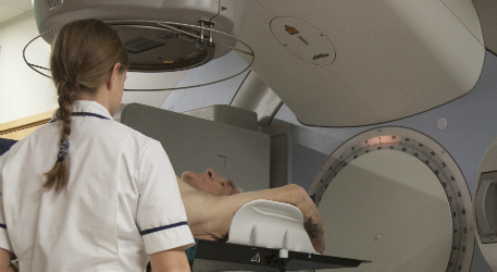 Male patient receiving radiotherapy treatment