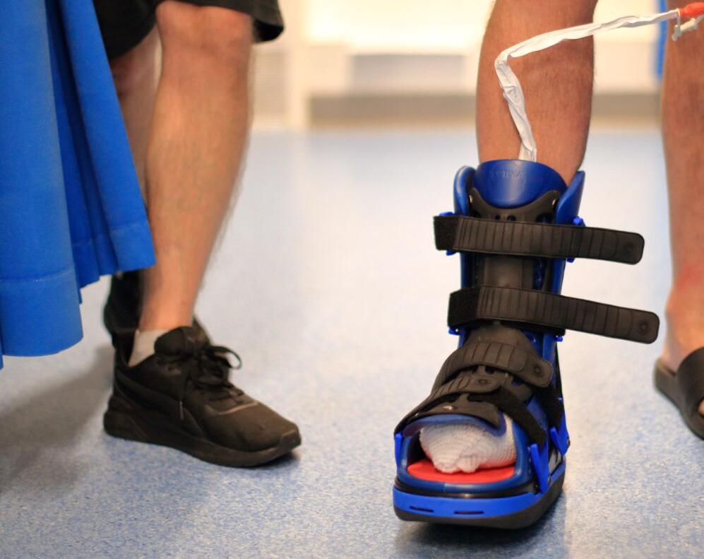 Patient wearing a support boot