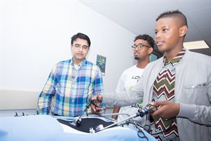 Donel trying out some microscopic equipment (2)
