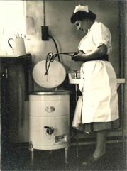 Dorothy using the steriliser