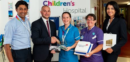Helen receiving her award