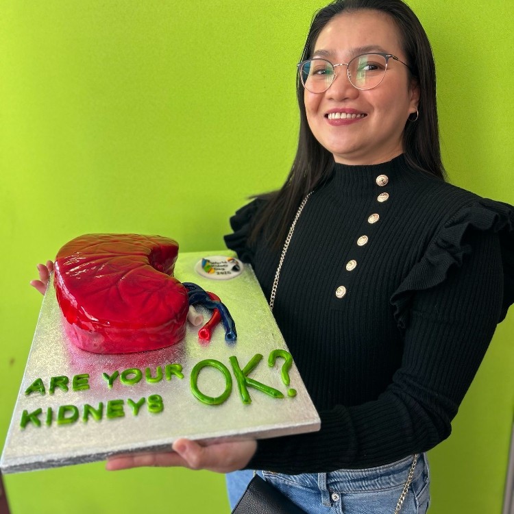 UHS nurse, Marianne, with her winning cake entry.