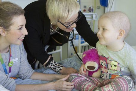 Staff with girl with toy.jpg